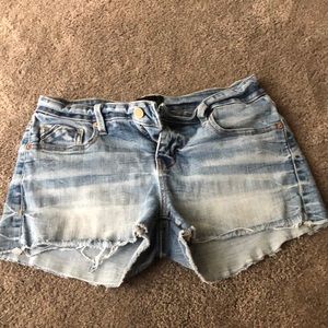 Buckle black denim shorts size 27